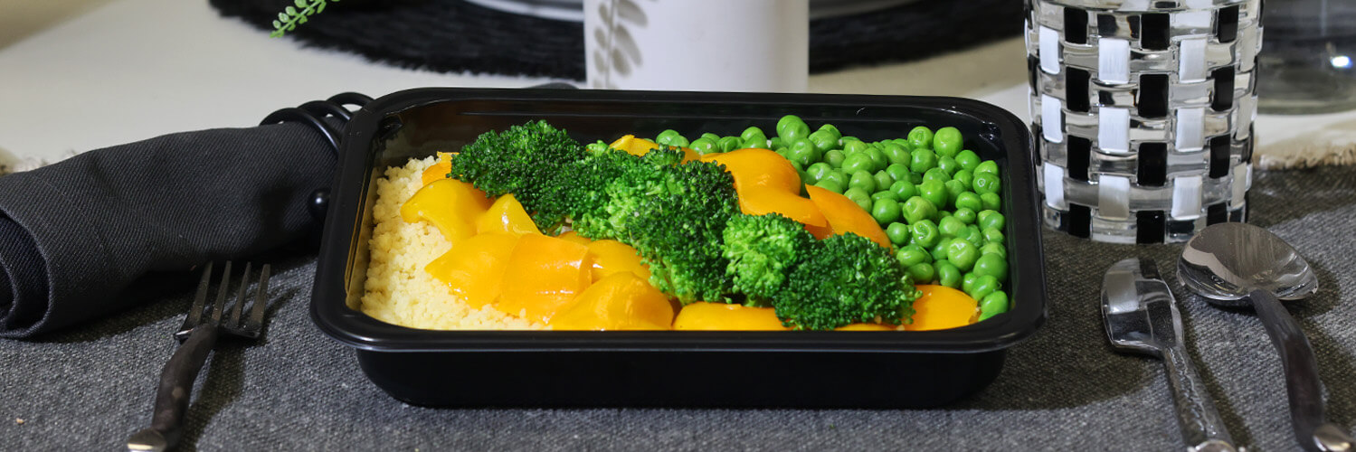 Healthy vegan meals served in a microwave safe meal prep containers